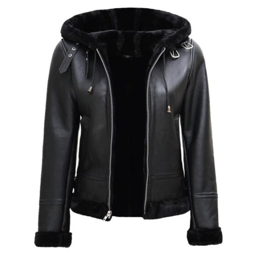 Woman wearing the Women’s Black Leather Hooded Shearling Jacket featuring sleek black leather, soft shearling lining, and a cozy hood for a stylish and warm winter look.