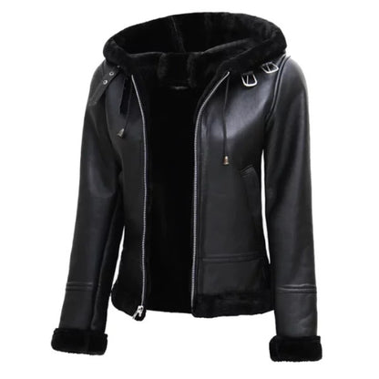 Woman wearing the Women’s Black Leather Hooded Shearling Jacket featuring sleek black leather, soft shearling lining, and a cozy hood for a stylish and warm winter look.