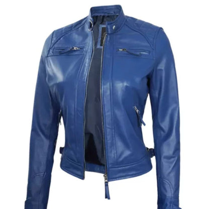 Women’s blue biker leather jacket with a sleek fitted design, front zipper closure, lapel collar, and smooth premium leather finish, styled for a modern edgy look.