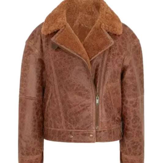 Women’s brown cracked shearling jacket with vintage texture, cozy lining, and rugged stylish design